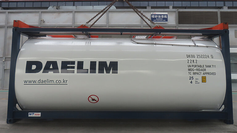 White ISO tank container labeled "DAELIM" with GRP tank cladding