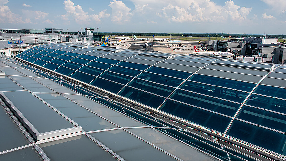 Glass roof over Frankfurt Airport Station LAMILUX PR60 glass roof as a barrel roof on airport building for noise protection
