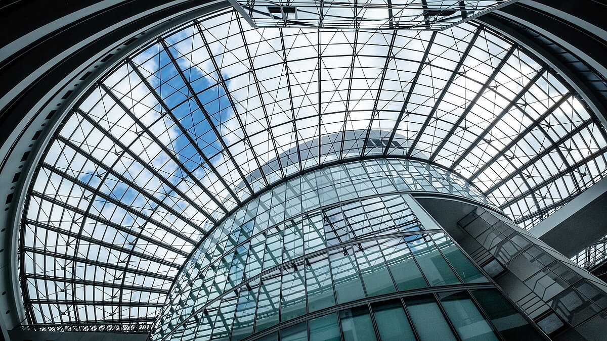 Impressive glass roof structure in the BMW Group Research and Innovation Centre (FIZ), showcasing modern design and abundant natural light.